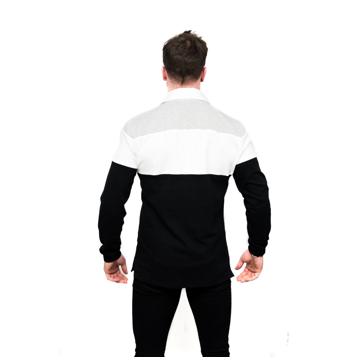 The back of a man wearing a Guinness Toucan Rugby Jersey.