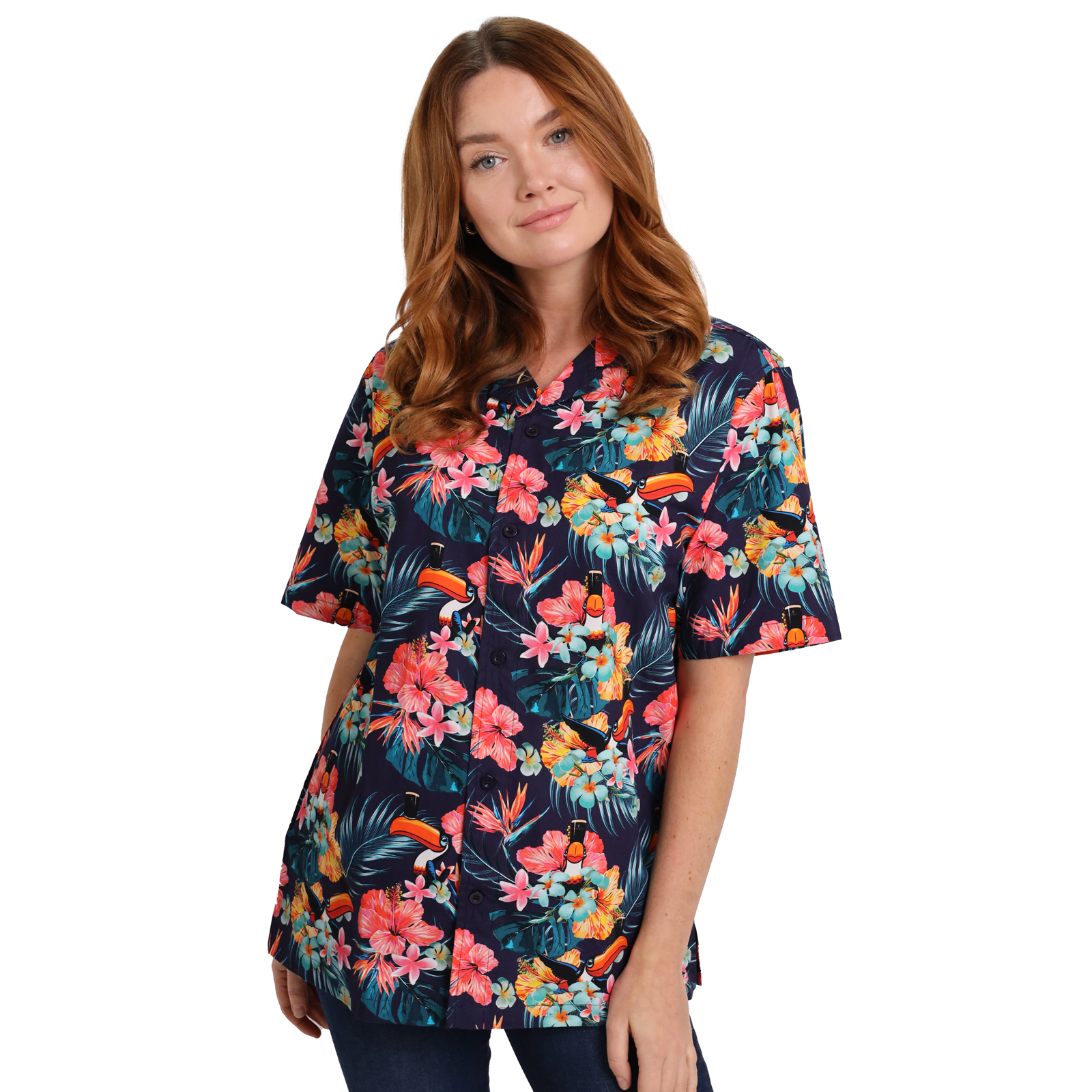 A person with long hair wearing a short-sleeve, button-up Guinness Toucan Hawaiian Shirt by Guinness, standing and smiling slightly. The vibrant shirt is made from 100% cotton.