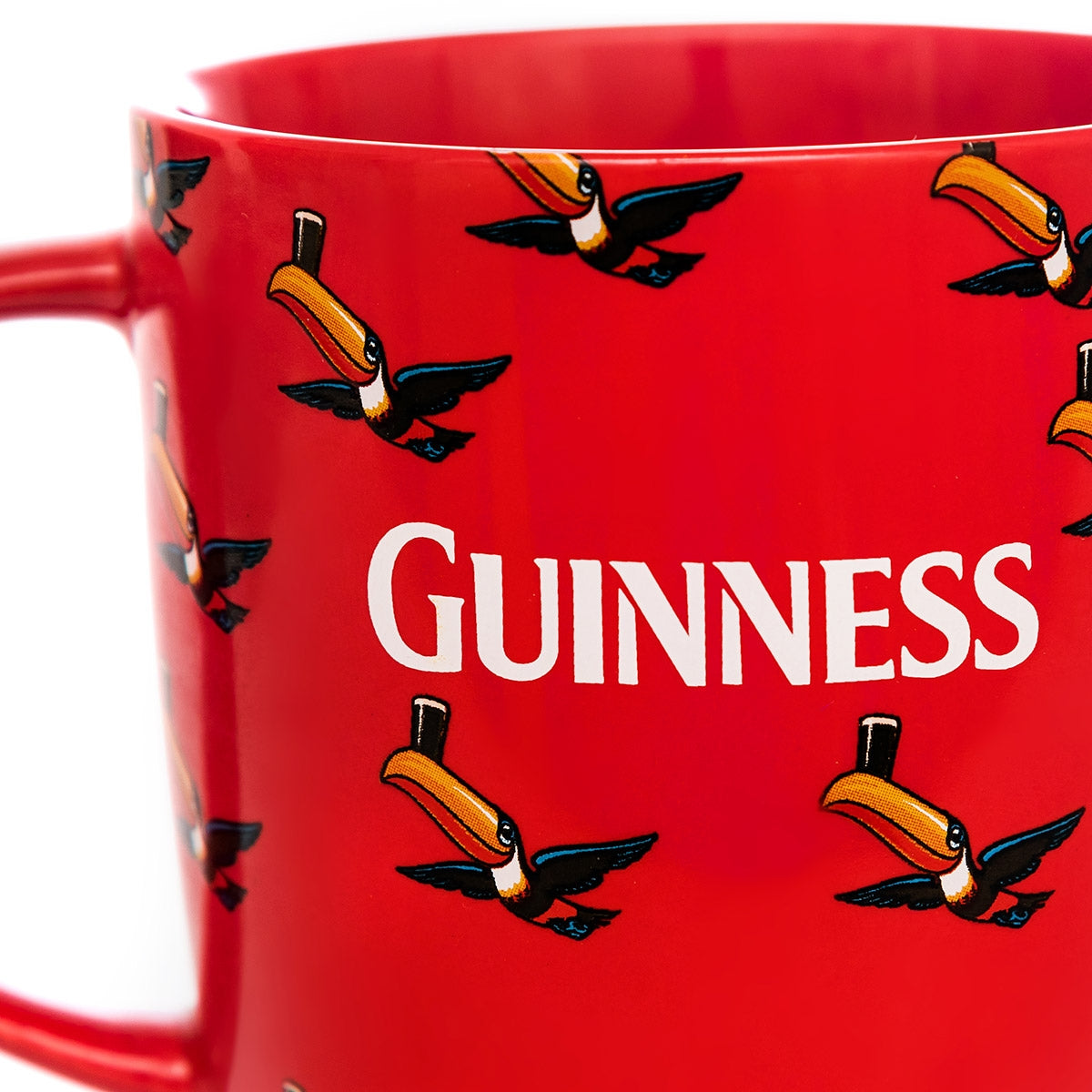 Guinness Red Mug with Multiple Flying Toucans.