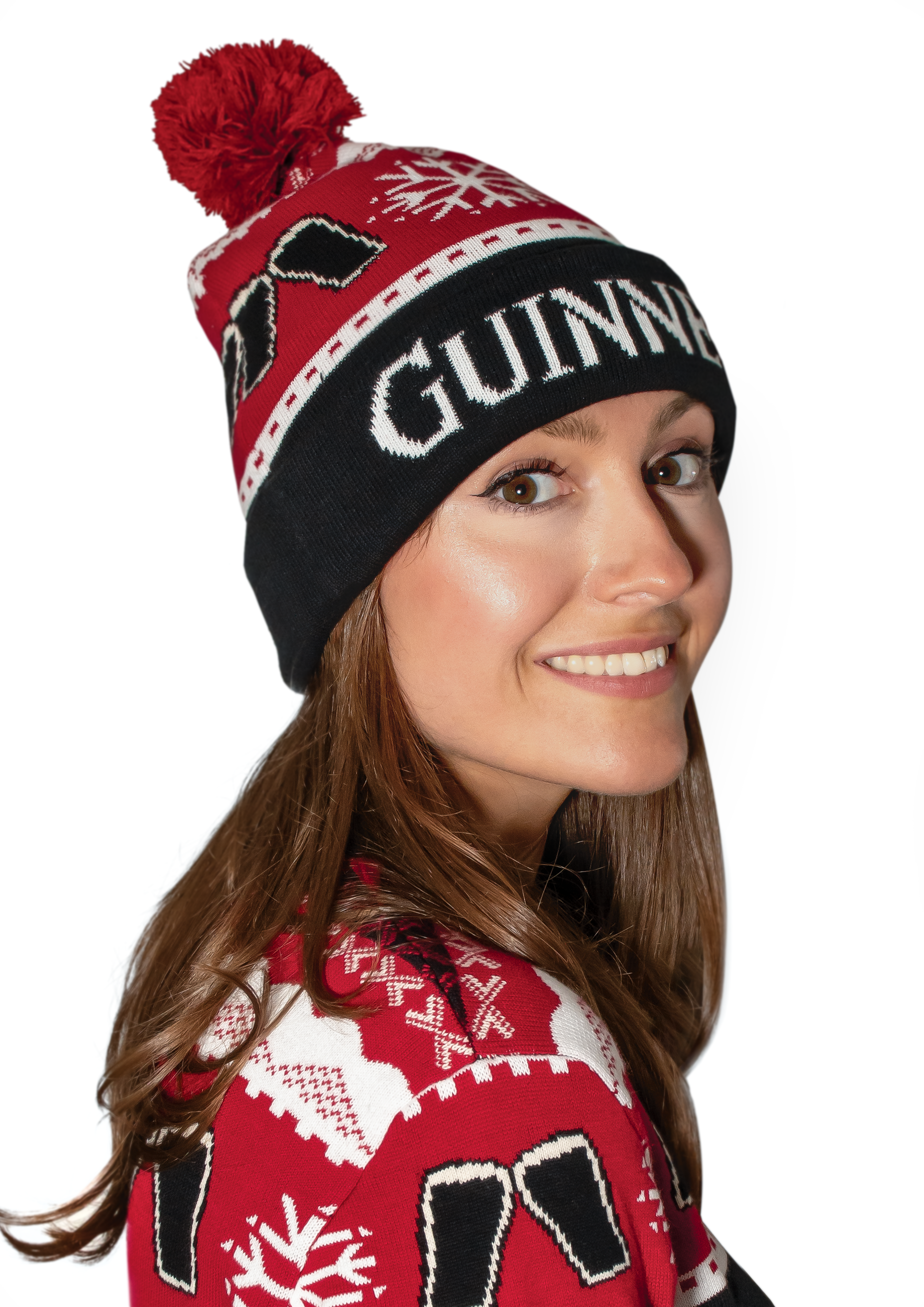A woman sporting an Official Guinness Holiday Beanie in a Christmas-inspired design made with BCI cotton.