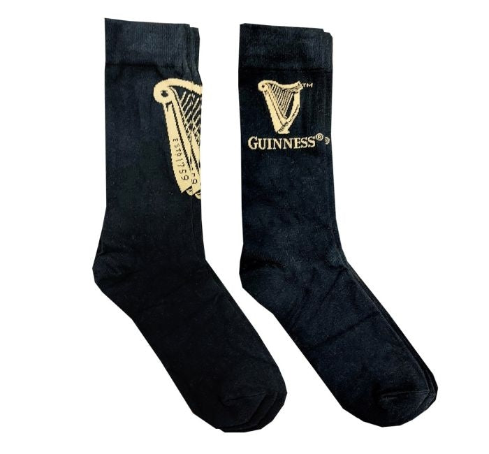 Cozy Guinness Harp socks in a can (2 pack), perfect as a gift.